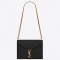 Saint Laurent Cassandra Clasp Bag In Black Grained Leather