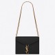 Saint Laurent Cassandra Clasp Bag In Black Grained Leather