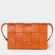 Bottega Veneta Cassett Bag In Orange Intrecciato Lambskin