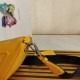 Prada Triangle Shoulder Bag In Yellow Leather