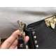 Valentino Mini Rockstud Hobo Bag In Black Grained Leather